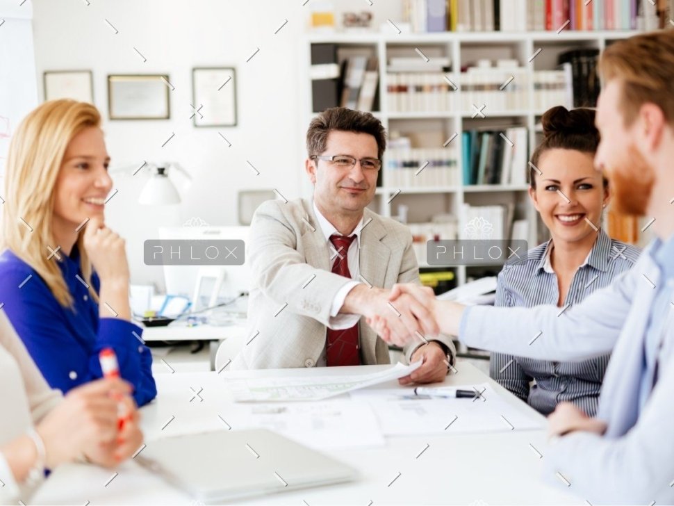 demo-attachment-642-group-of-business-people-working-as-team-in-9HPC4DK-1